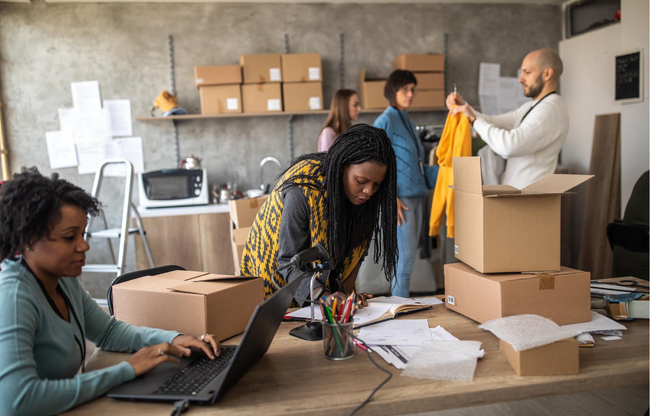 E-commerce small business owners reconciling sales and managing online shop bookkeeping with NeatLedger. E-commerce owners managing sales and bookkeeping with NeatLedger